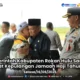 181 Jemaah Haji Rokan Hulu Disambut Adat Tepung Tawar di Bandara Tuanku Tambusai