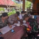 Bhabinkamtibmas Desa Pergung Dampingi Posyandu, Tingkatkan Layanan Kesehatan Balita dan Lansia
