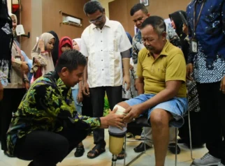 Bupati Kampar Serahkan Bantuan Disabilitas dan ATENSI, Tegaskan Komitmen Pemerintah Hadir untuk Masyarakat