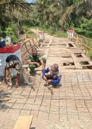 Progres Pembangunan Jembatan Beton Garuda di Desa Penindaian: Kolaborasi TNI dan Masyarakat untuk Infrastruktur Penguat Konektivitas